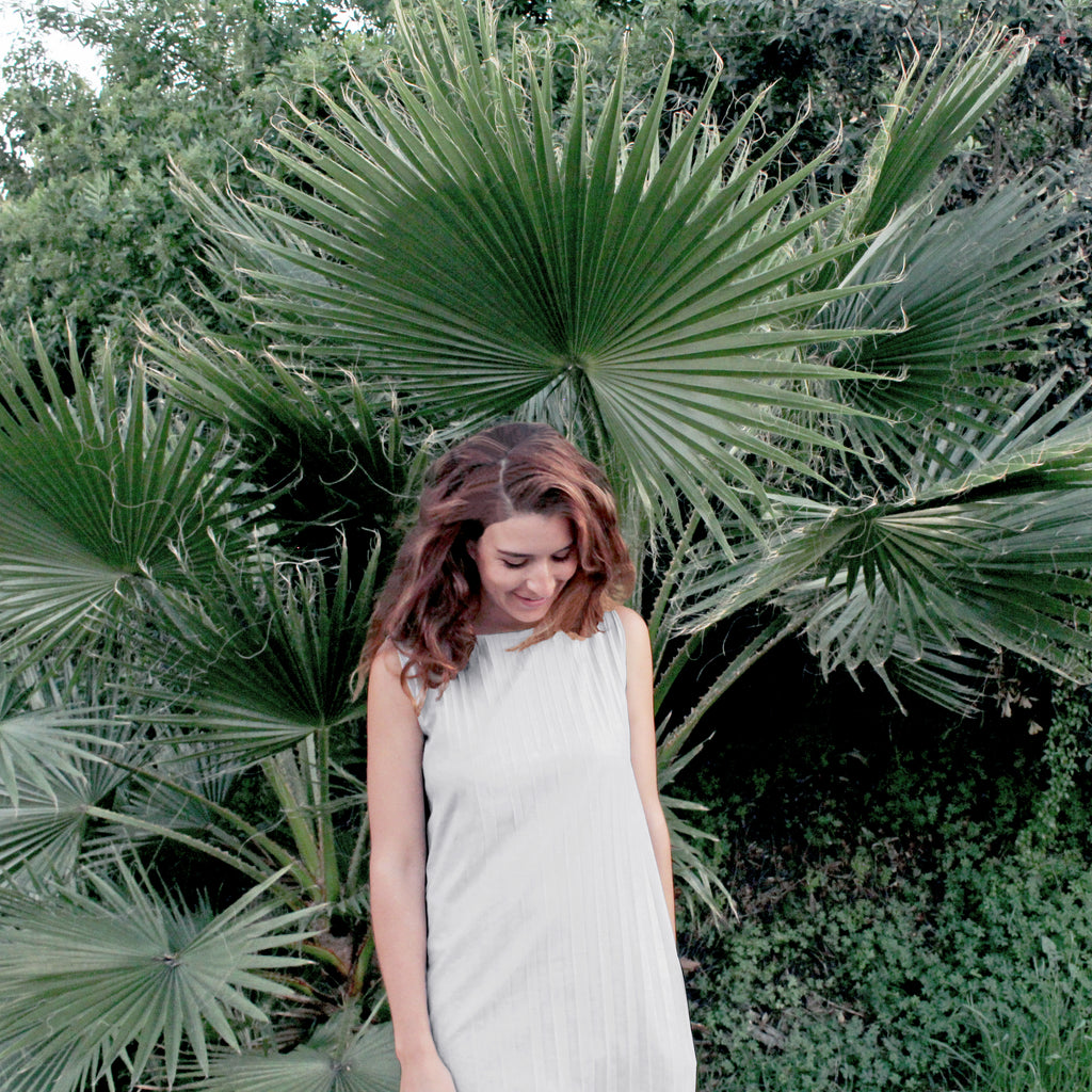 how to fold a pleated dress for travel 6 Chic Ways to Style a Pleated Dress