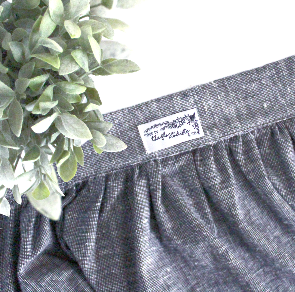 Custom clothing tag sewn into the waistband of the Jupiter Wrap Skirt